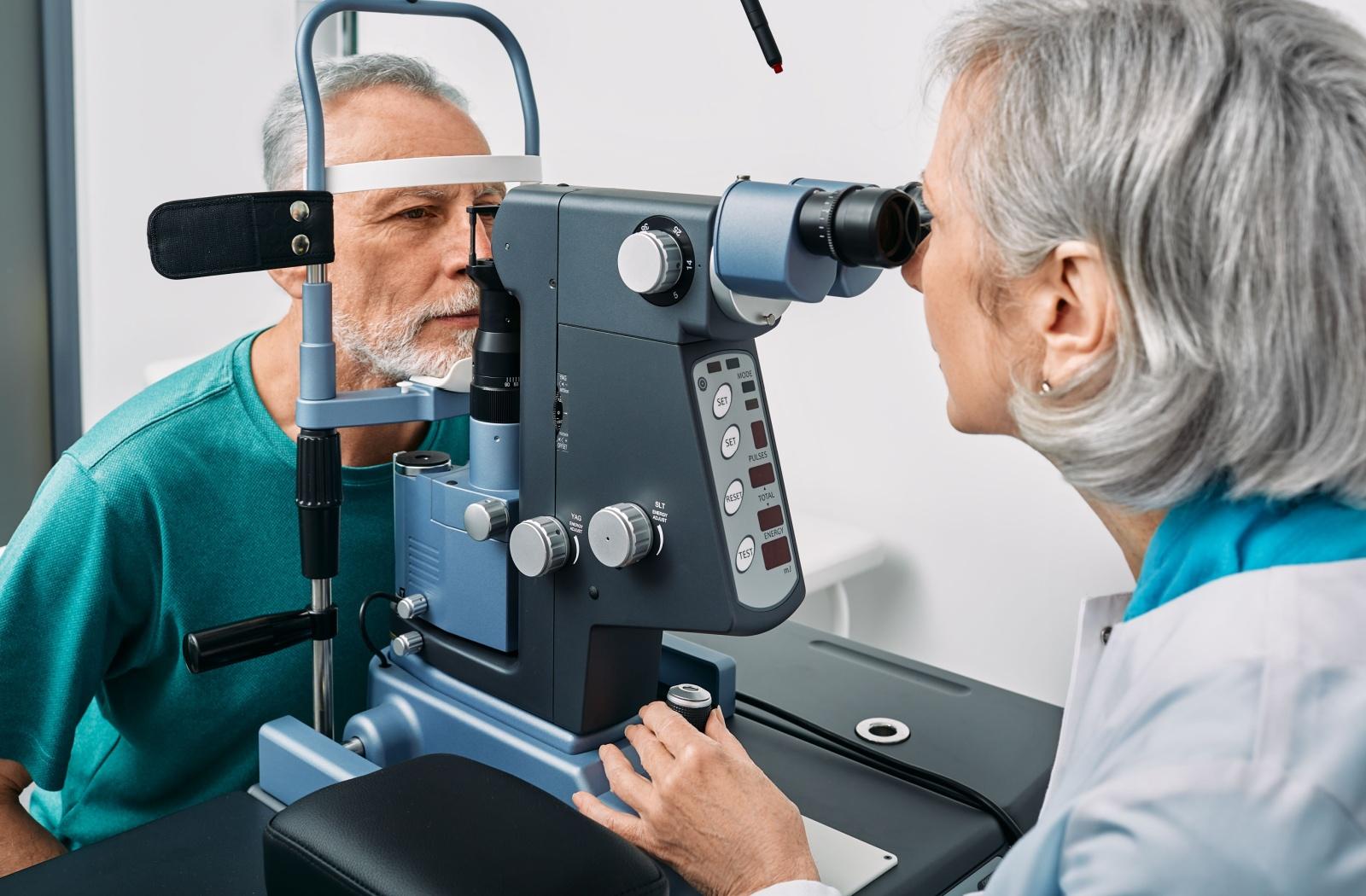 A person at an eye exam, monitoring for signs of glaucoma.